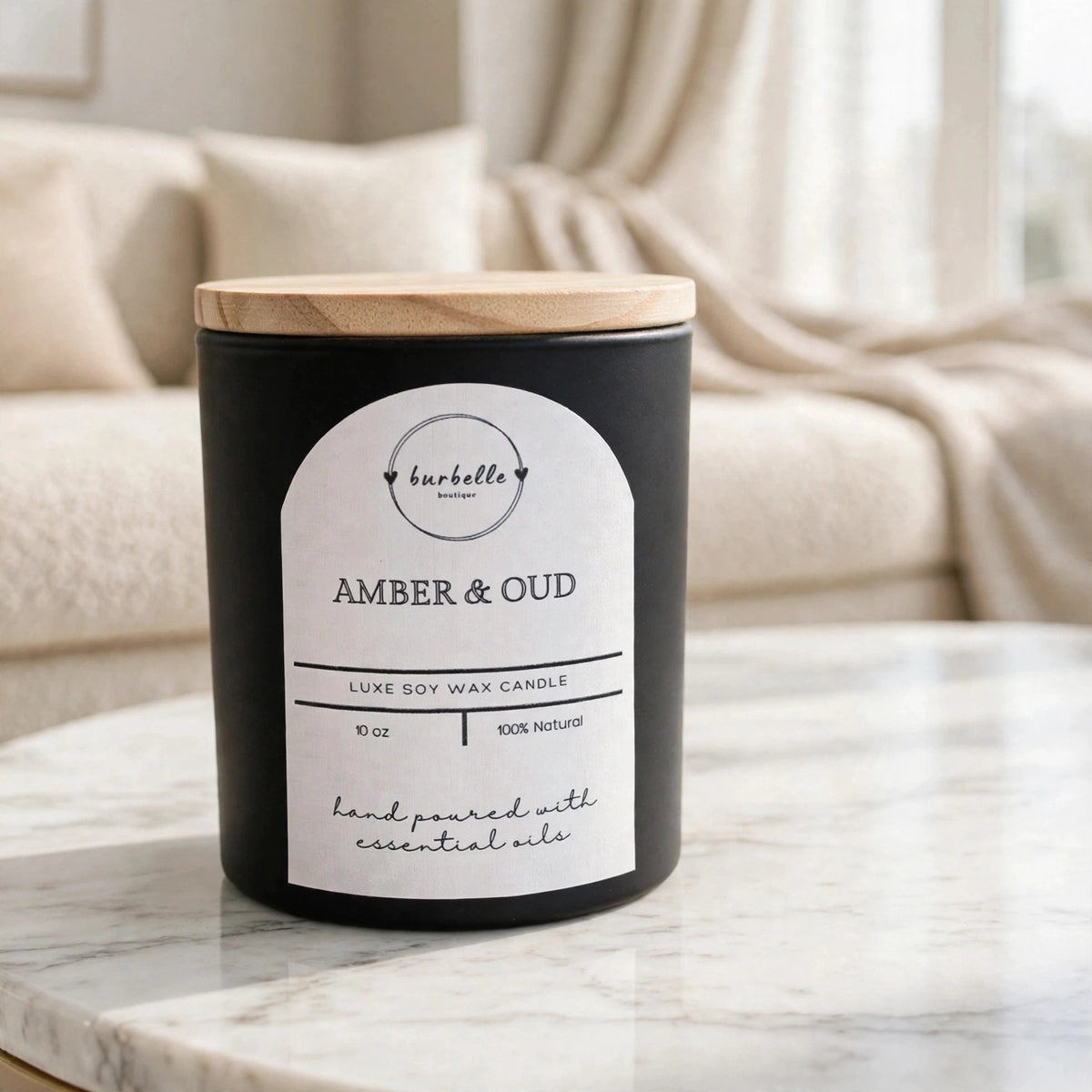 Amber & Oud luxe soy wax candle with the wooden lid closed on top, on a marble coffee table in a bright living room. Phthalate-free non-toxic candle made with essential oils, Burbelle Boutique.